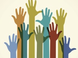 colored hands in the air